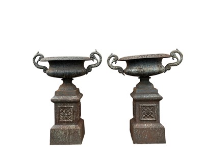 Lot 1791 - PAIR OF CAST IRON GARDEN URN PLANTERS