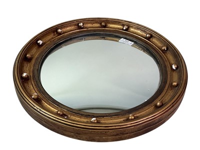Lot 630 - GILT CONVEX PORTHOLE WALL MIRROR